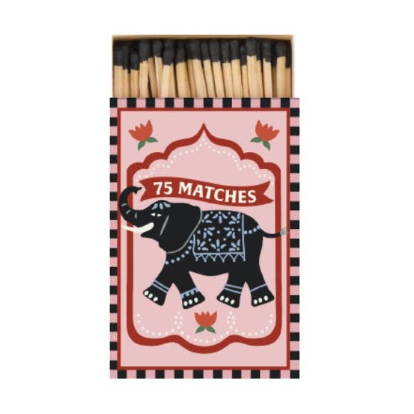 Matchbox with elephant design and '75 Matches' text on a white background