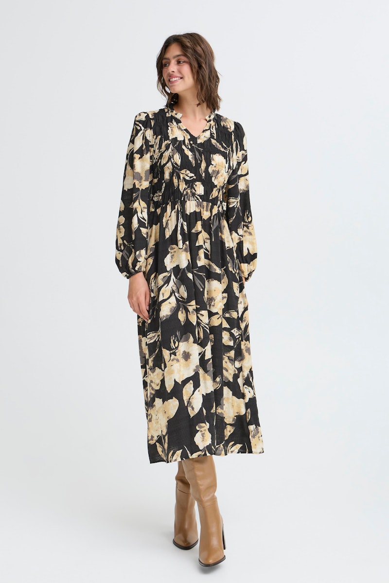 Fransa Ariana Dress 14 in DIS FLORAL. Woman wearing a floral dress with long sleeves on a white background