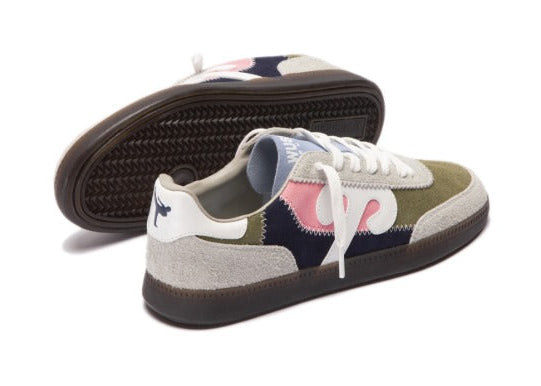 Multicolored sneaker with patterned design on a white background