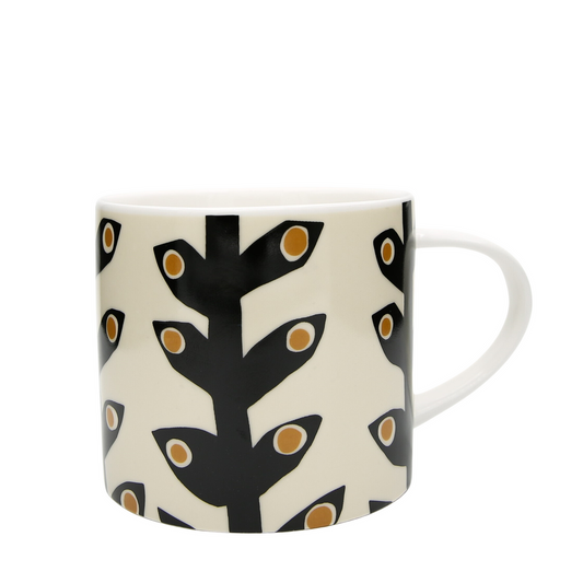 Mug with black and orange abstract pattern on a white background