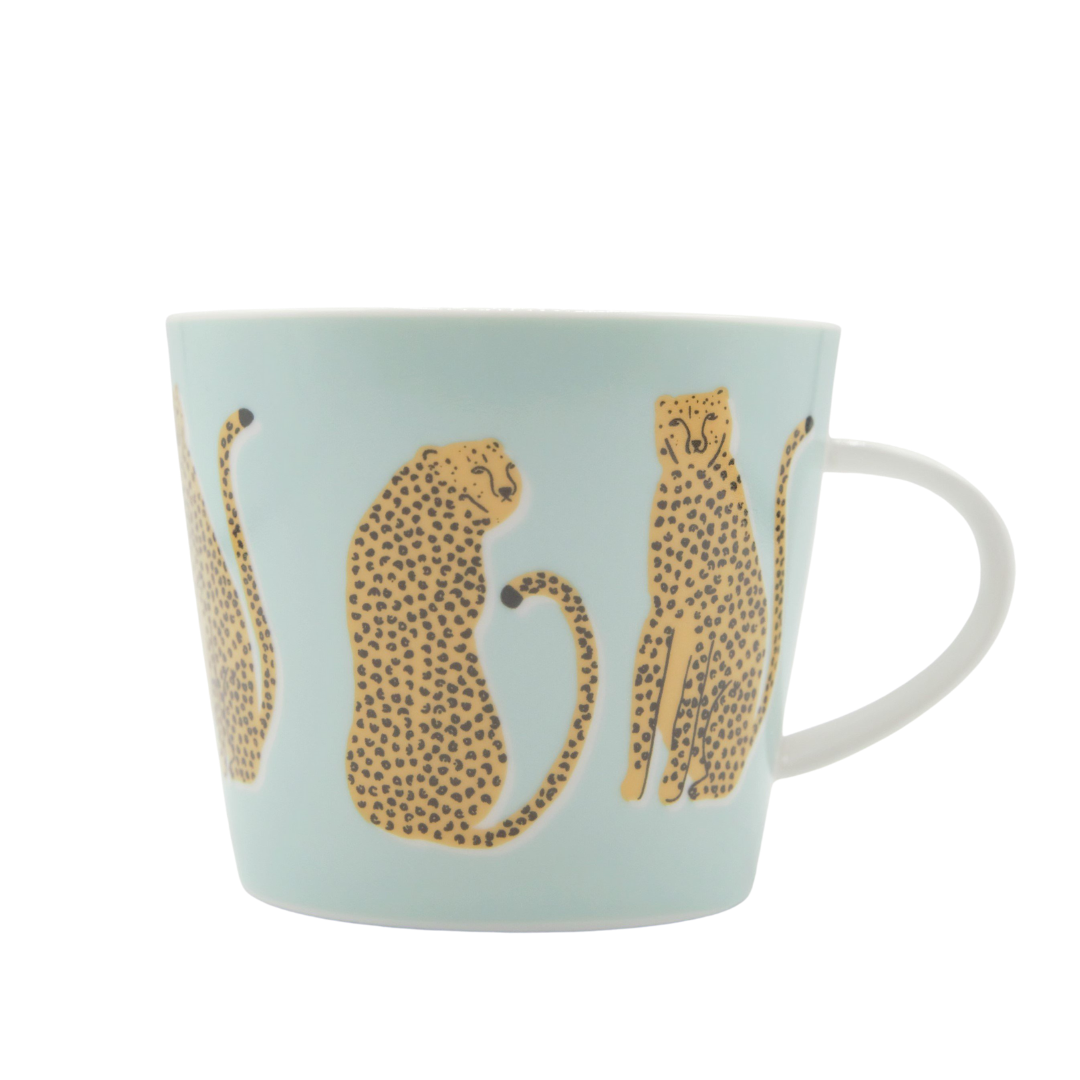 Mug with cheetah design on a light blue background