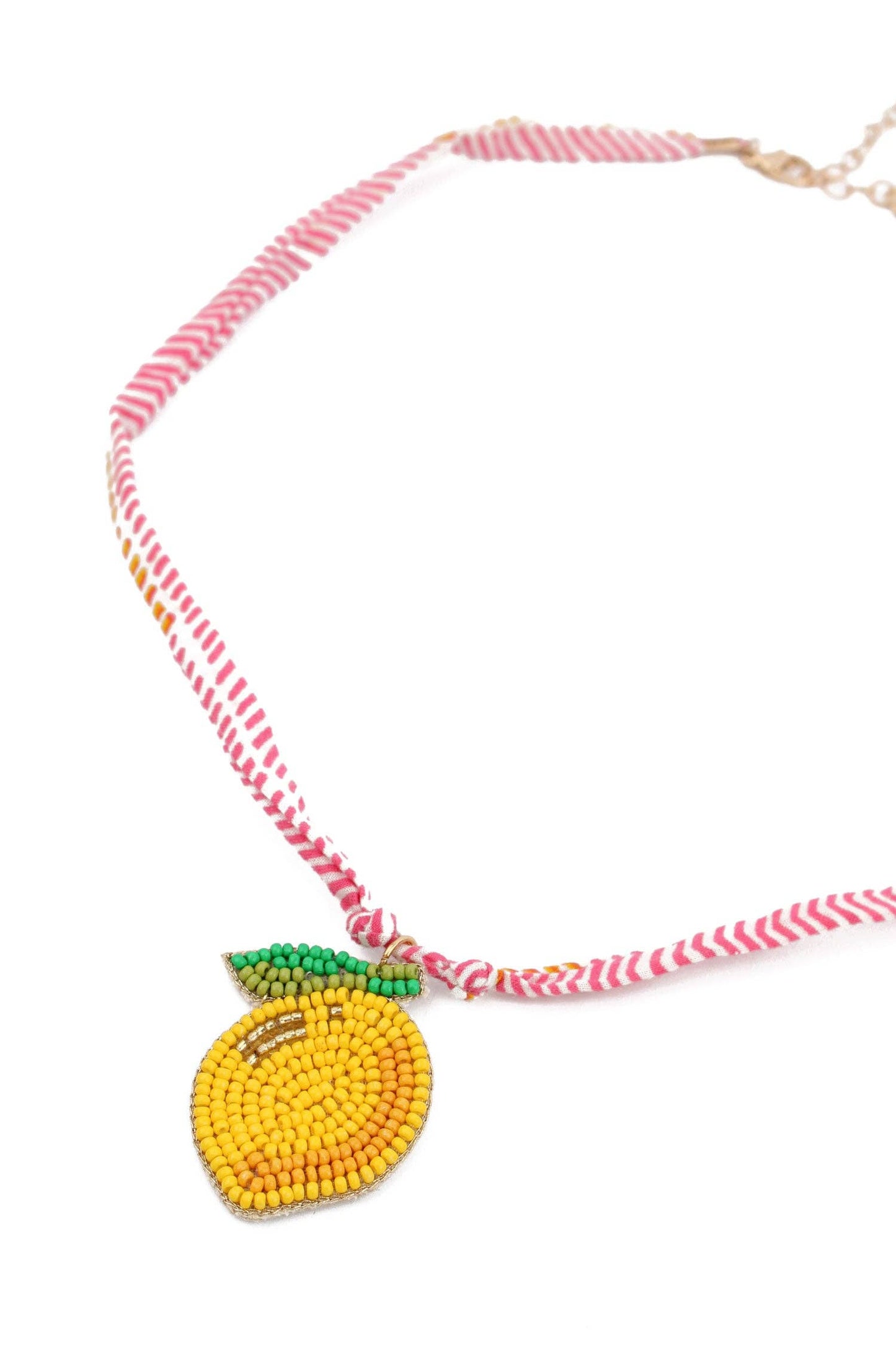 My Doris Necklace with a beaded lemon pendant on a white background