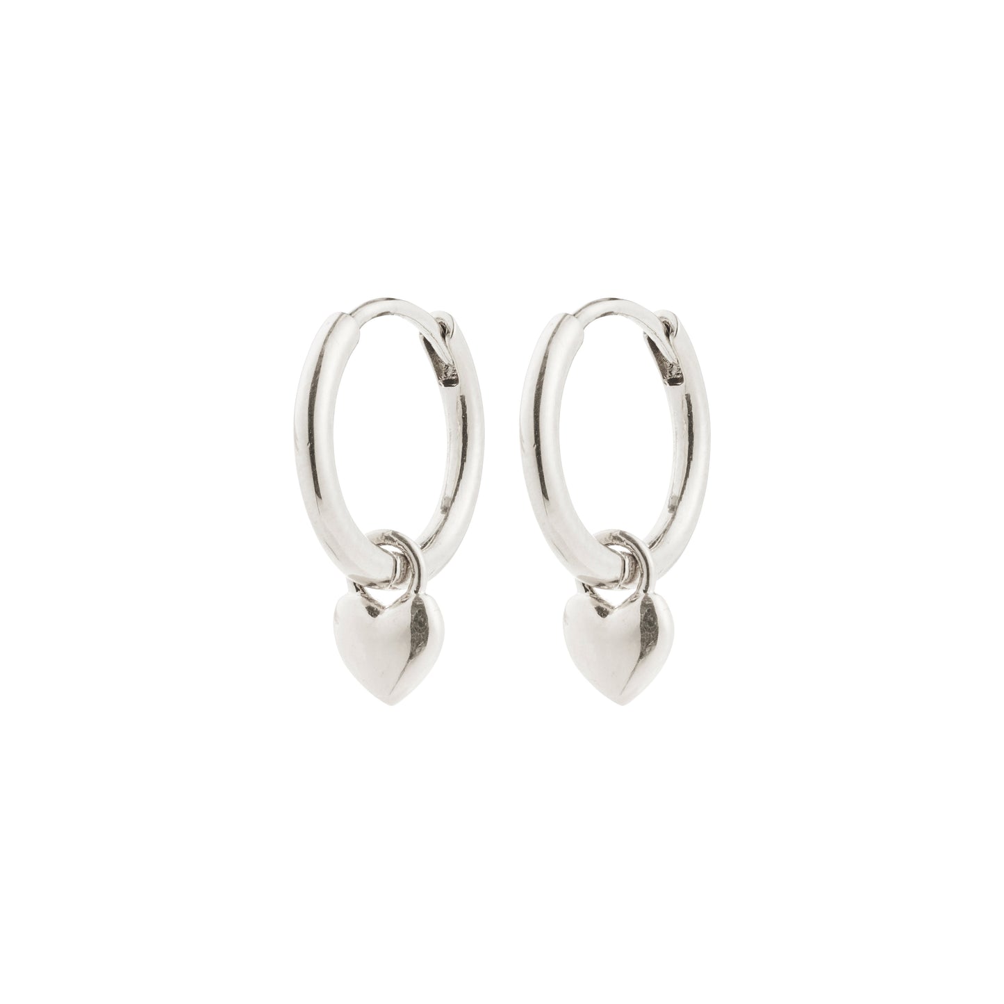 Pilgrim ALAIA earrings silver-plated. Silver hoop earrings with heart charms on a white background