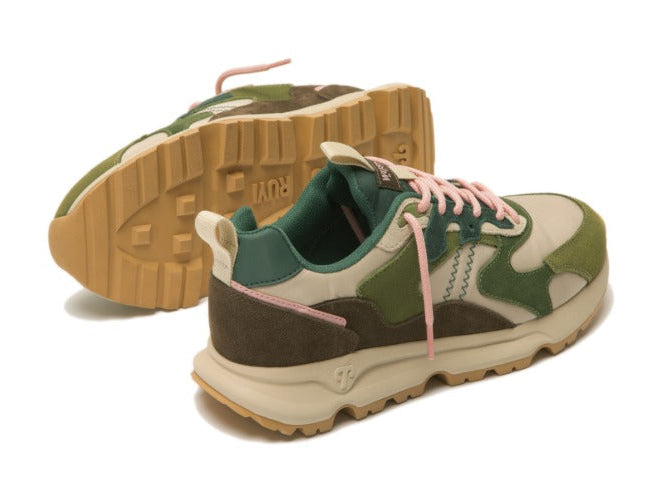 Camouflage sneakers with pink laces on a white background