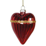 Red glass heart ornament with gold accents on a white background