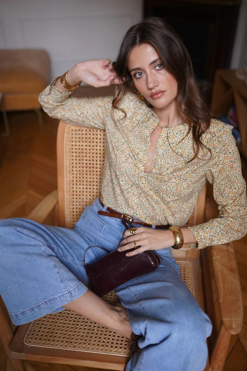 Floral Print shirt with a peter pan collar paired with pale blue jeans