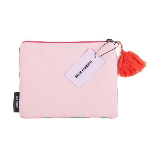 Pink pouch with a tassel and tag on a white background
