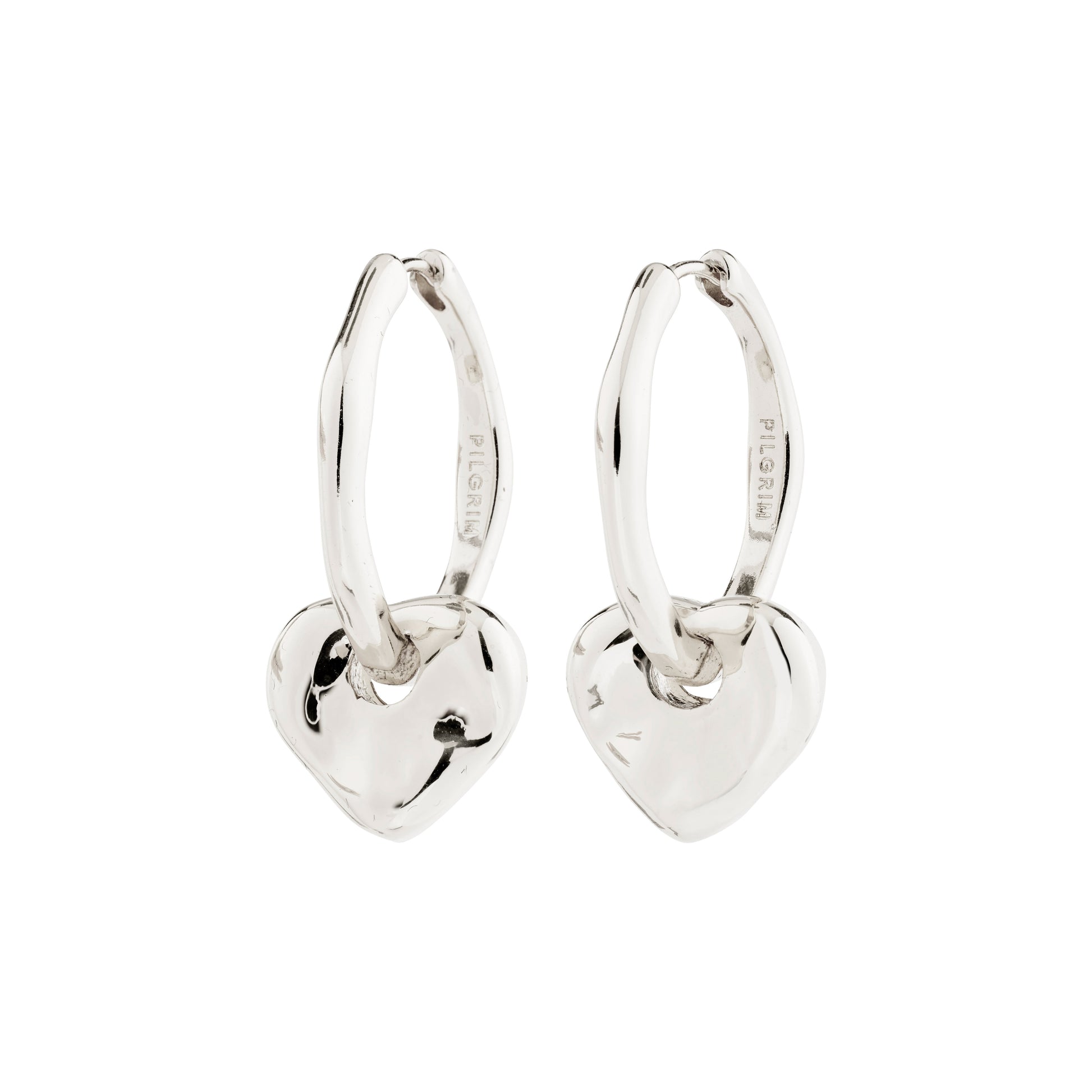 Silver heart-shaped hoop earrings on a white background