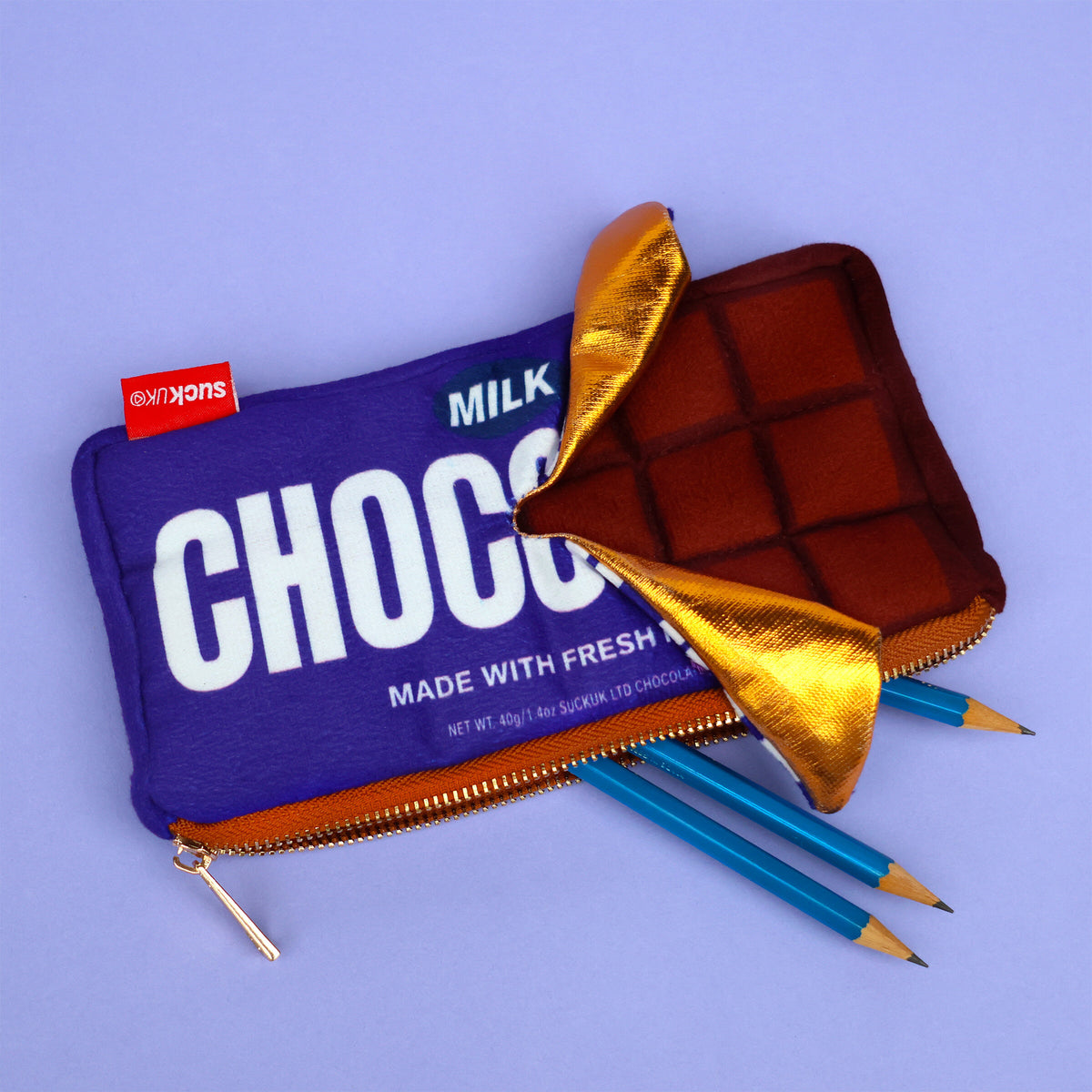 Plush Chocolate Zip Pouch - Pencil case designed like a chocolate bar with blue packaging and gold accents on a purple background