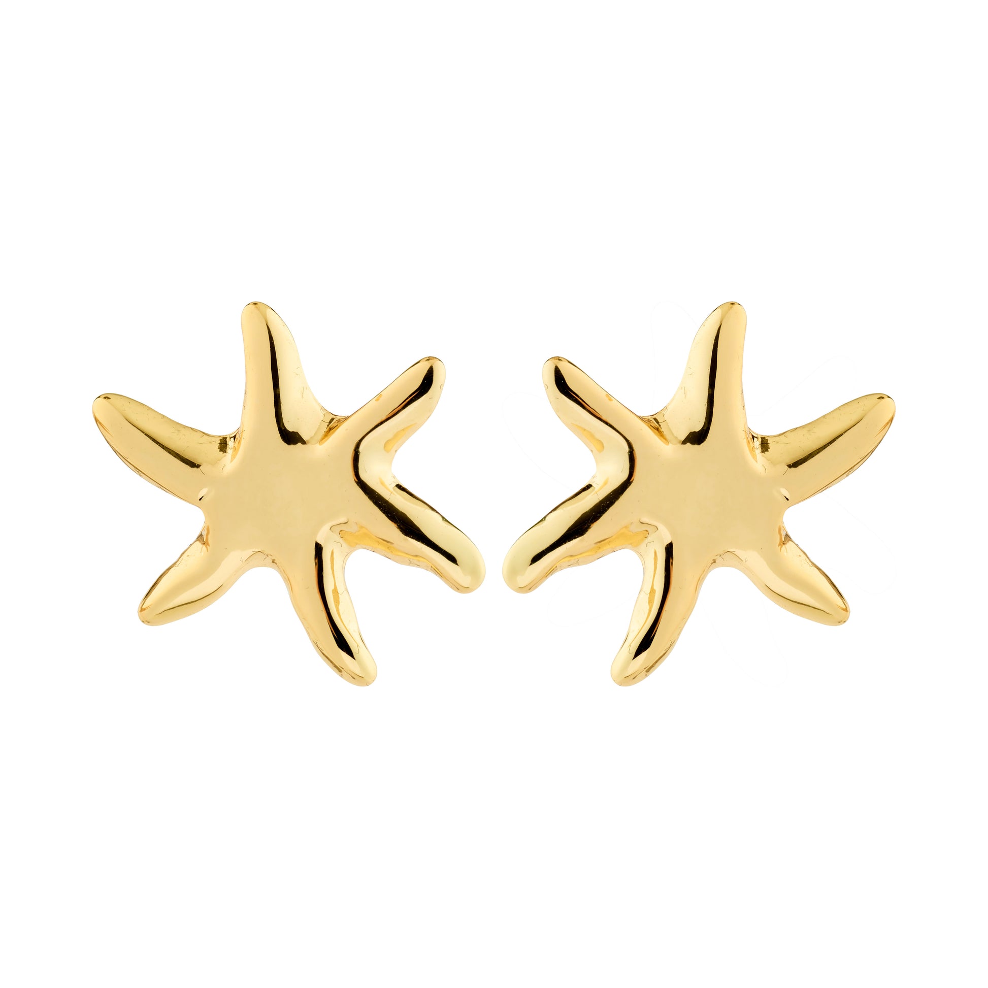 Gold starfish earrings on a white background