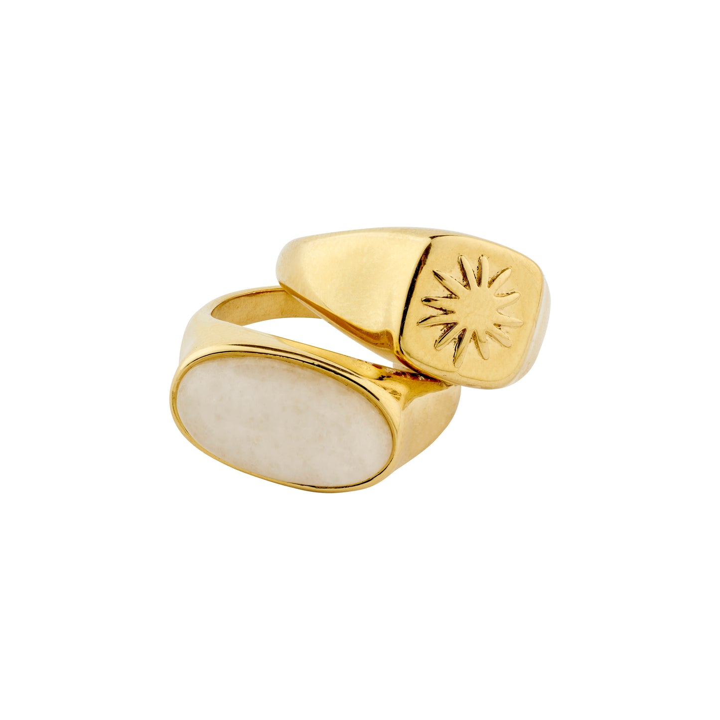 Gold ring with a white stone on a white background