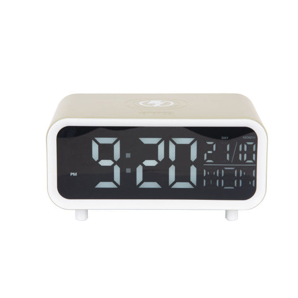 Digital clock with a white casing on a white background