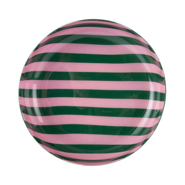 Round object with pink and green horizontal stripes on a white background