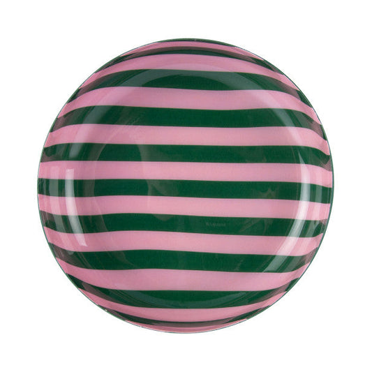 Round object with pink and green horizontal stripes on a white background
