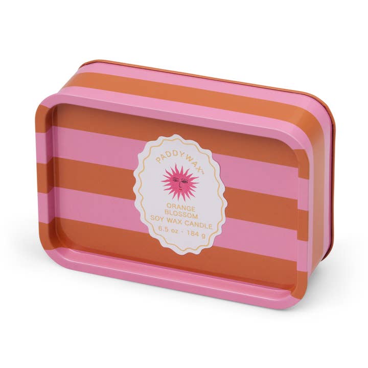Striped pink and orange tin with a label on a white background