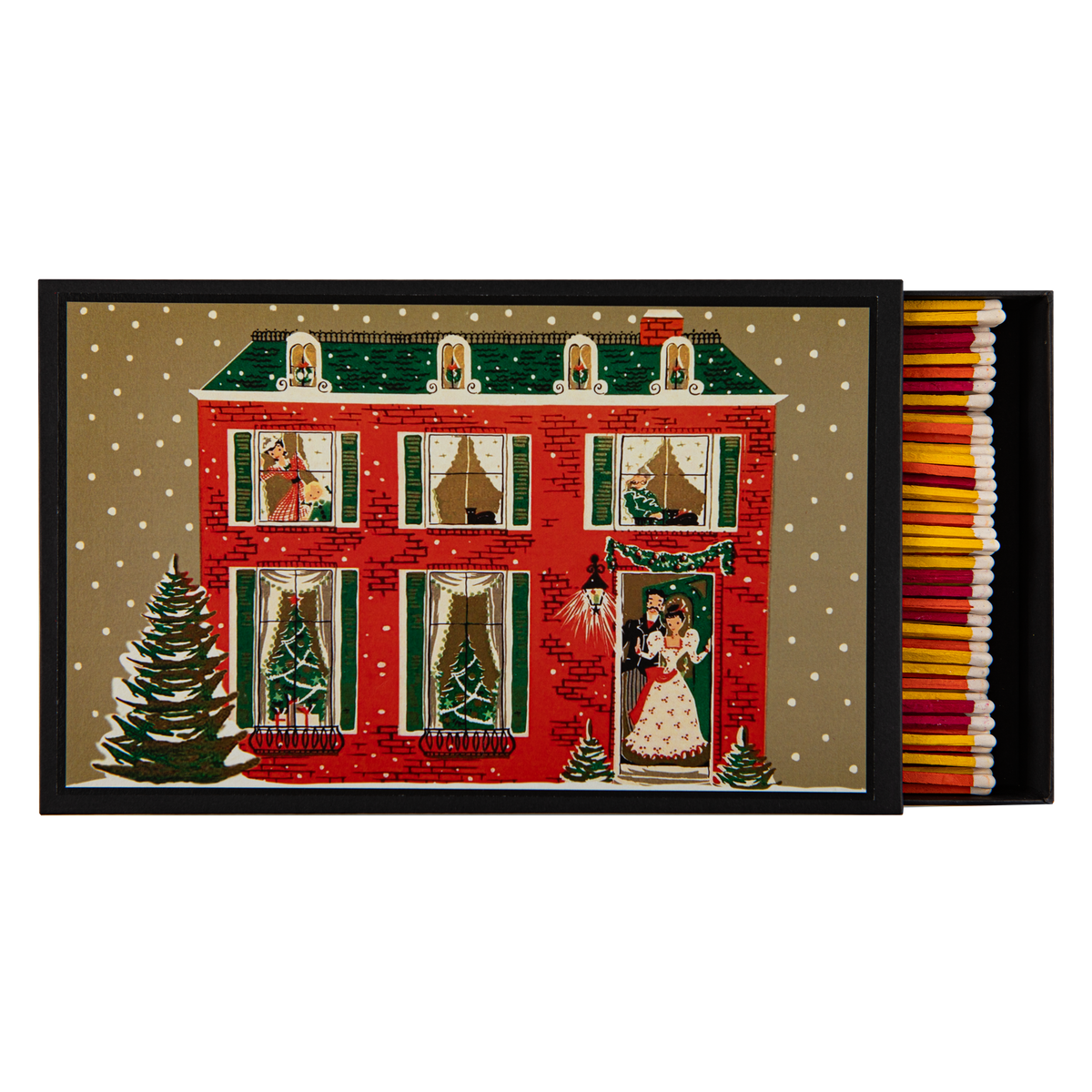 A Christmas-themed matchbox with a red brick house illustration under snow, shown open with colorful matches inside on a white background.