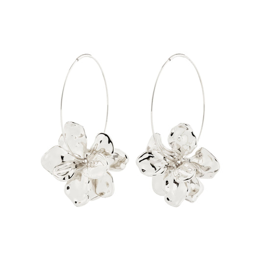 Silver floral hoop earrings on a white background