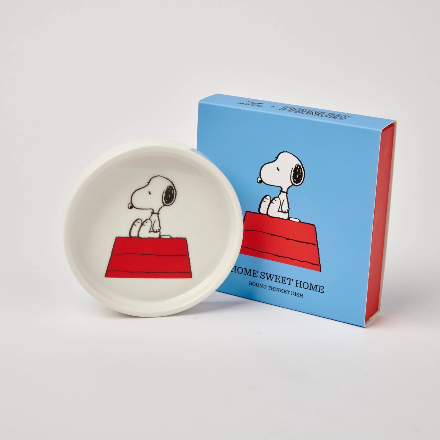 Snoopy-themed trinket dish and packaging on a white background