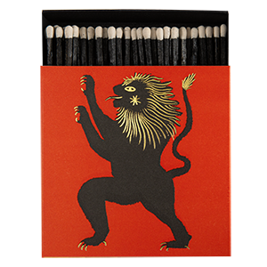Matches with a lion design on a red background
