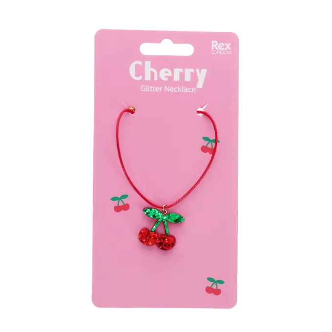 Cherry-themed glitter necklace on a pink card with 'Rex' branding.