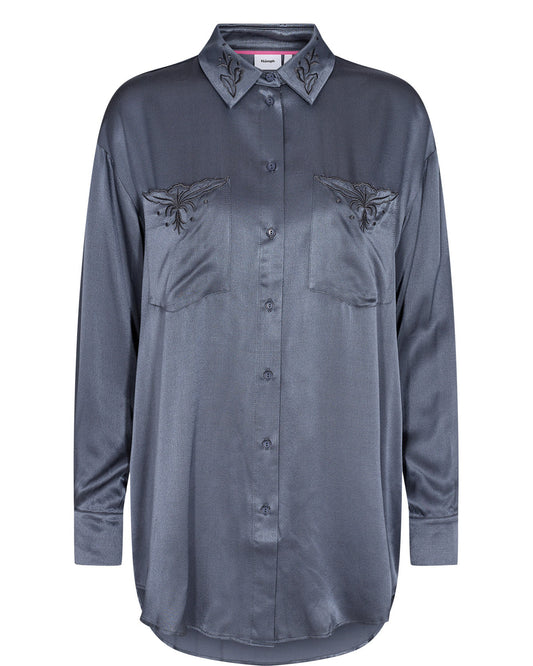 numph stylish long line shirt, made from a viscose in a pretty blue colour. embroidery detail at the collar and check pockets