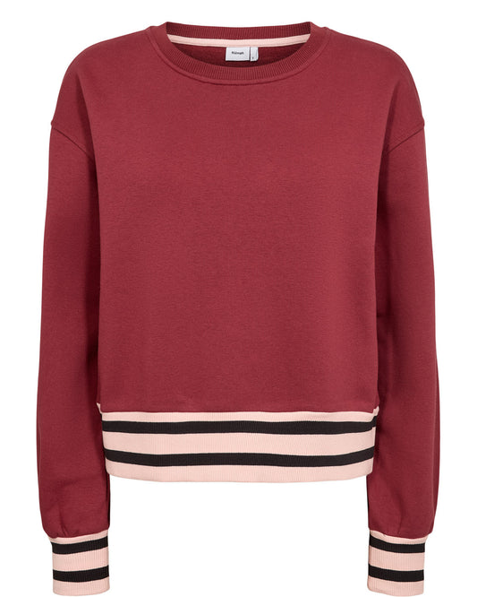 A crewneck sweatshirt in a deep  rich berry red, featuring a light pink and black striped ribbed hem and matching striped cuffs, shown against a plain white background.