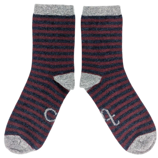 Pair of striped socks with gray cuffs and toes on a white background