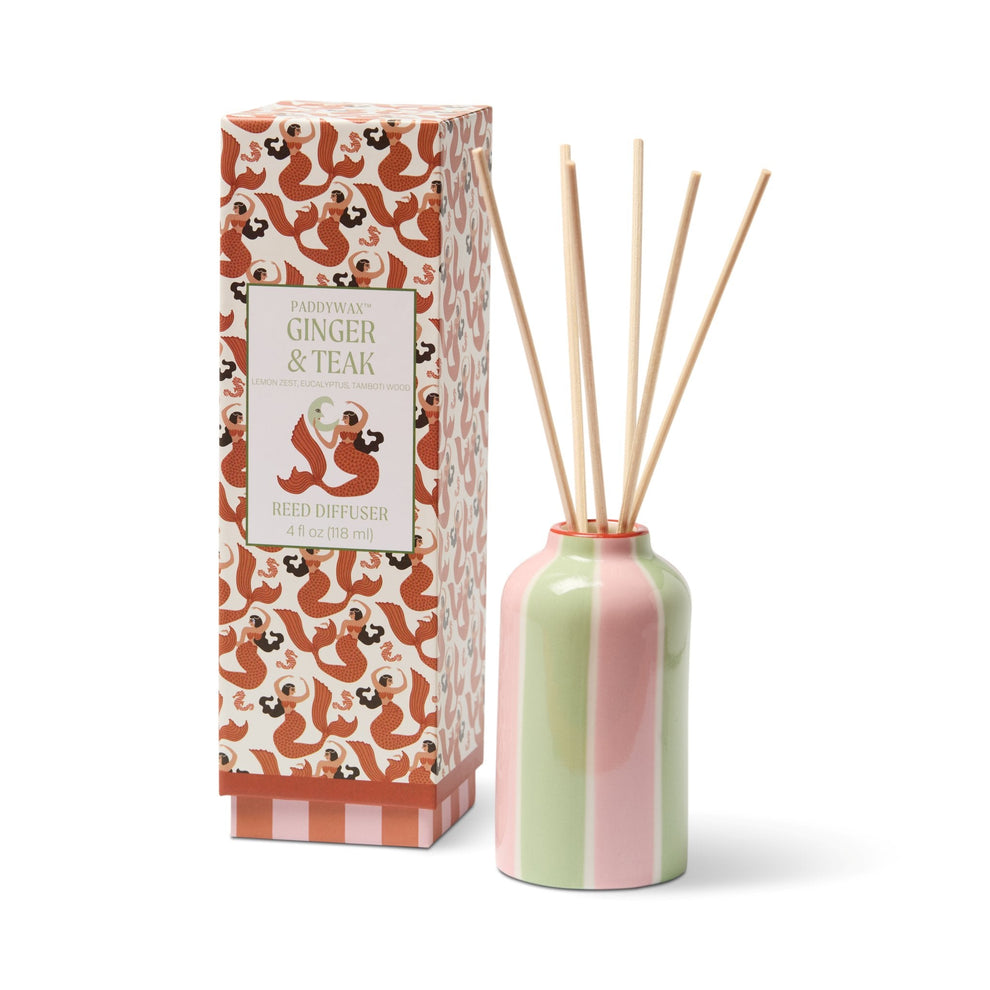 Ginger & Teak reed diffuser with packaging on a white background