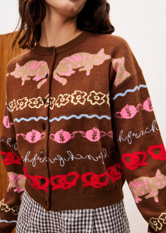 FRNCH ABYSSIN Cardigan in Ice Brown with pink cat pattern worn by a woman with checked trousers on
