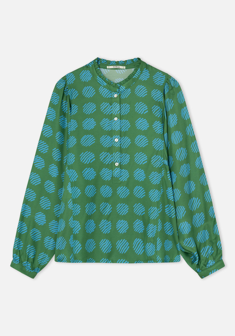 A green long-sleeve button-up shirt with a repeating light blue circular pattern, displayed flat against a light gray background.