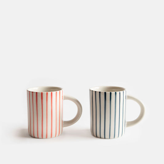 Two striped mugs on a white background