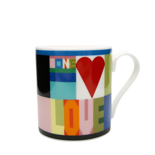 Colorful mug with 'LOVE' text and a heart design on a white background