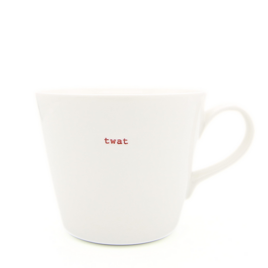 White mug with red text 't**n a white background