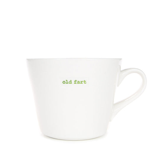 White mug with 'old fart' text in green on a white background