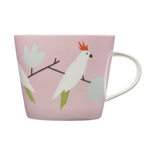 Pink mug with a white bird design on a white background