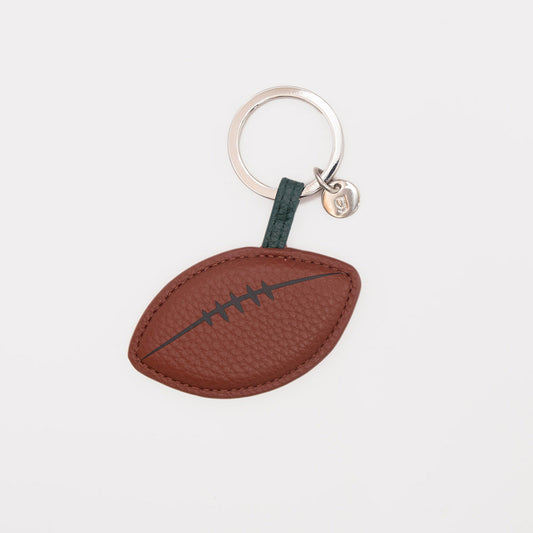 Football-shaped keychain on a white background