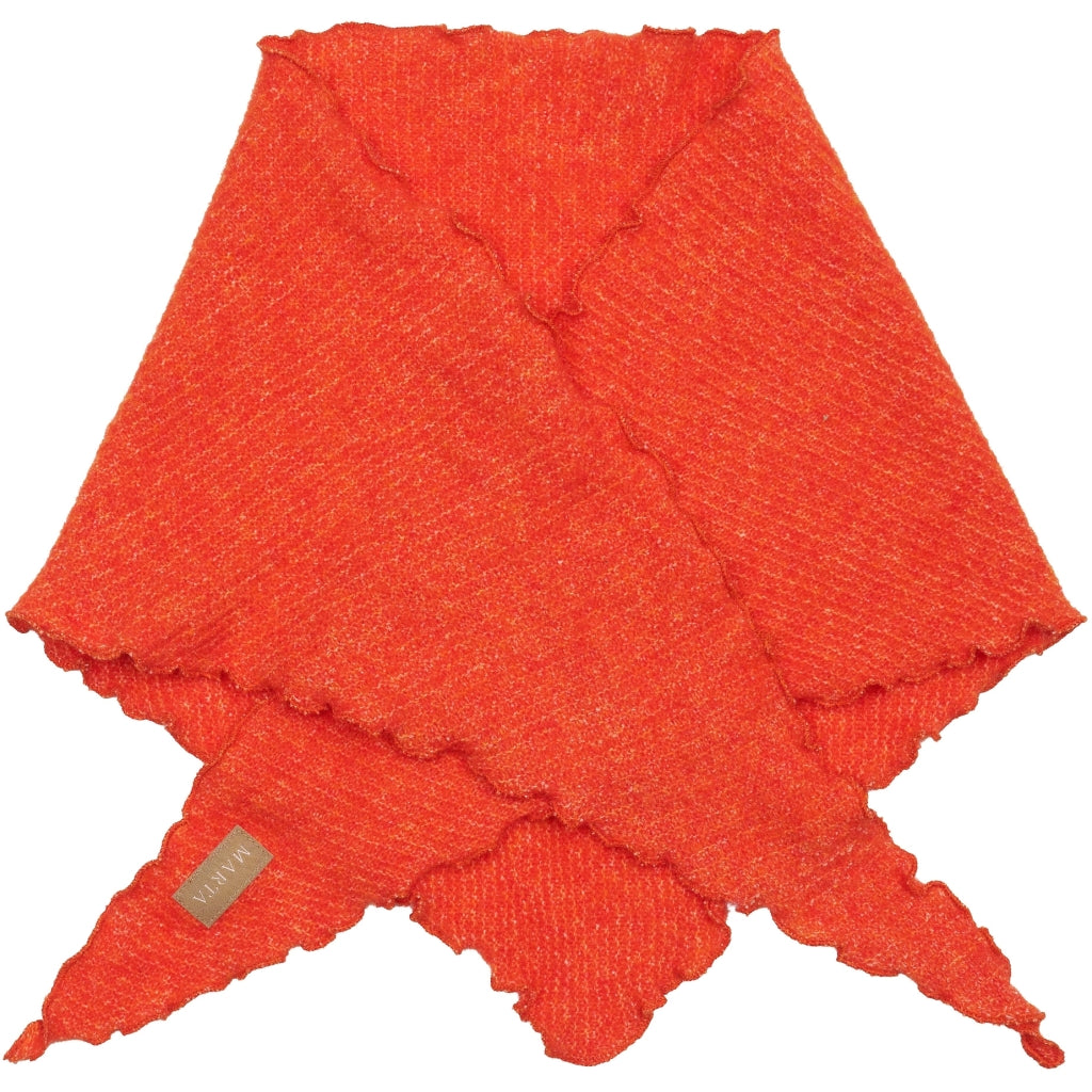 Marta Agnete Scarf in Orange - a bright orange textured knit wrap or scarf with ruffled edges, laid flat on a white background. A small beige fabric tag with the brand name 'MAMMY' is visible near the bottom left corner.