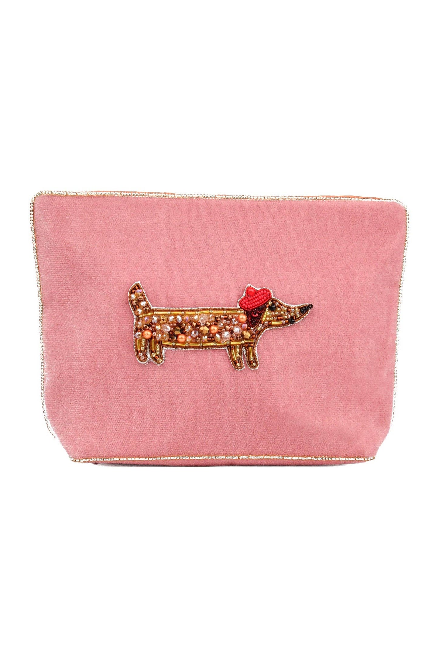 My Doris Pink clutch with a dog brooch on a white background