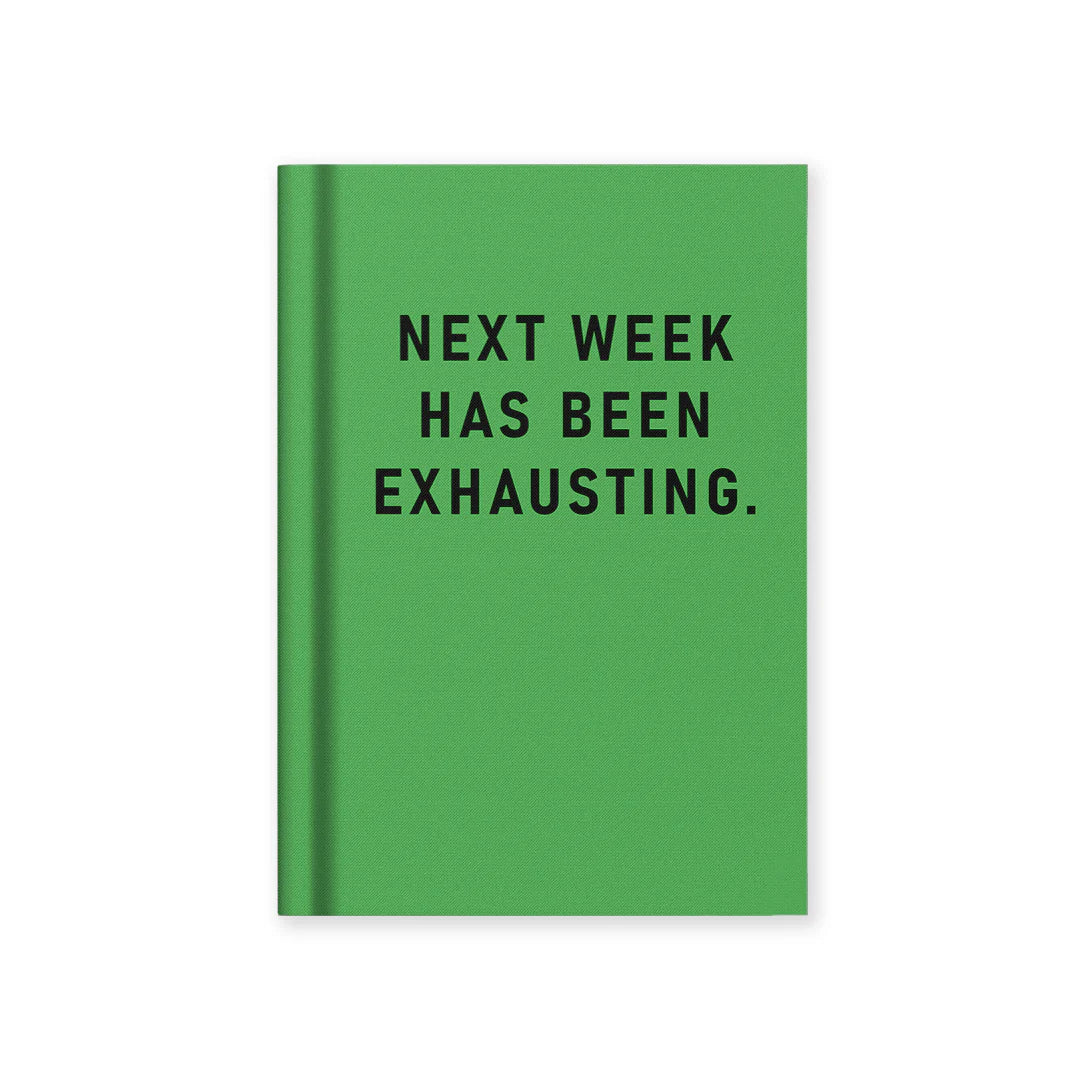 Green notebook with black text 'NEXT WEEK HAS BEEN EXHAUSTING.' on a white background
