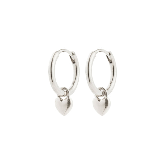 Pilgrim ALAIA earrings silver-plated. Silver hoop earrings with heart charms on a white background