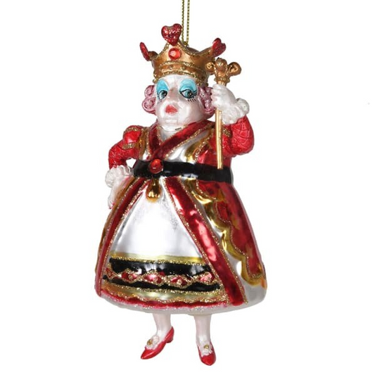 Decorative Christmas ornament of a king figure with a crown and robe on a white background