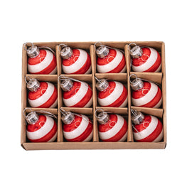 Red and white striped ornaments in a cardboard box on a white background