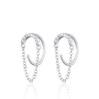 Reverse Sparkling Half Moon Huggie Earrings in sterling silver