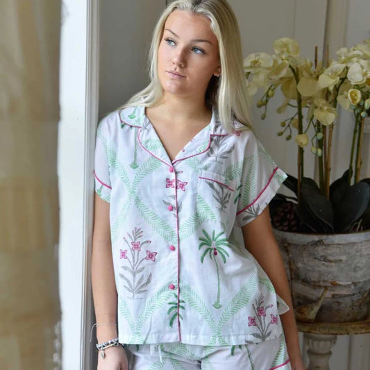 Short PJ cotton set with pretty palm tree and flower print on a white background and pink piping