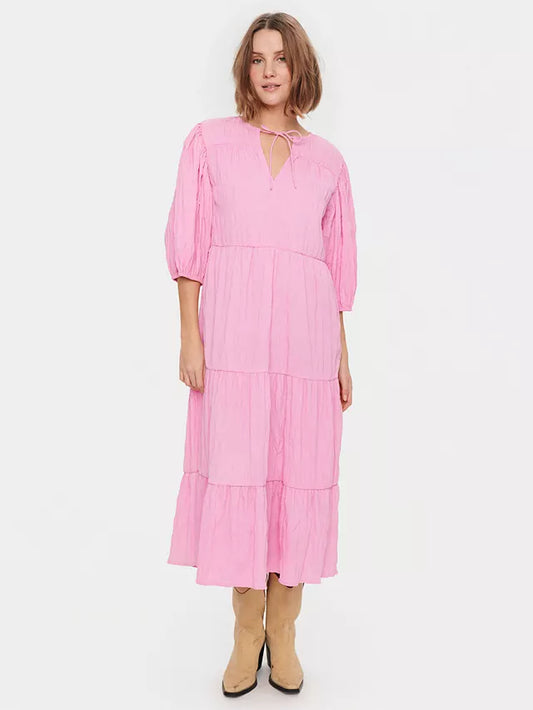 Cut to flatter in a tiered A-line shape, this mid-length dress from Saint Tropez is made from a lightweight fabric. Effortlessly flattering thanks to a fuss-free v-neckline and three quarter length sleeves, it sports a subtle textured effect for a tactile addition to your collection.