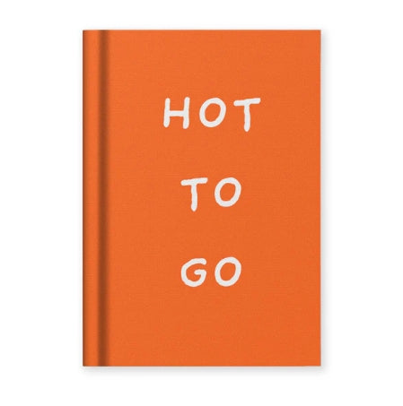 Orange book with 'HOT TO GO' text on a white background