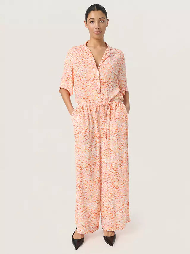 Smartened with a collar neckline and short sleeves, this jumpsuit from Soaked In Luxury is shaped to a straight leg and is cut from breezy viscose.
