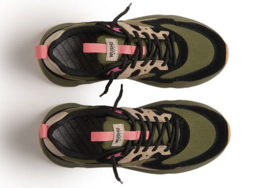 Pair of green and black sneakers with pink accents on a white background