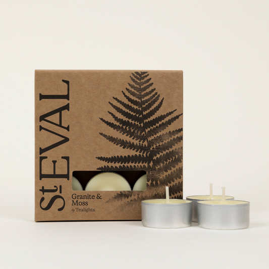 St Eval Granite & Moss, Scented Tealights. Tea lights with 'St Eval' packaging featuring a fern design on a white background