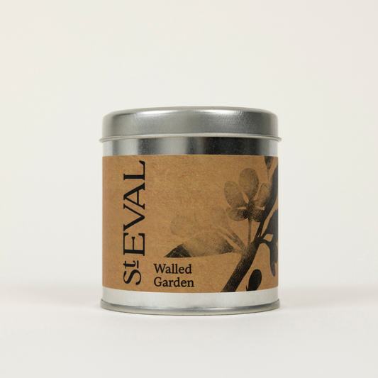 St Eval Walled Garden, Scented Tin Candle. Candle tin labeled 'St. Eval Walled Garden' on a white background